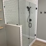 New shower with acrylic, nonporous, shower pan, pony wall with quartz cap, 3/8 frameless glass with diamond coated clean glass