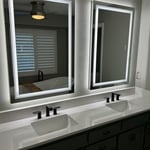 New mirrors in quartz, countertop and black faucets