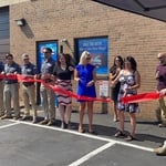 Team at our new locations ribbon cutting