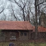 View of the front after shakes were installed