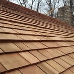 Close-up of the cedar shake wood planks that our used to replace the roof