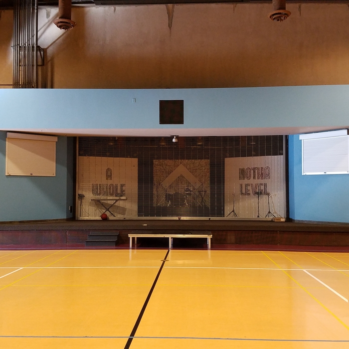 finished it off with rolling gates to protect tv's from getting hit by basketballs