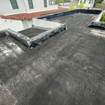 Existing roof has 5 layers and a black emulsion coating