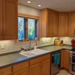 After Picture: New subway tile, grout, caulk, outlets, switches, and faceplates