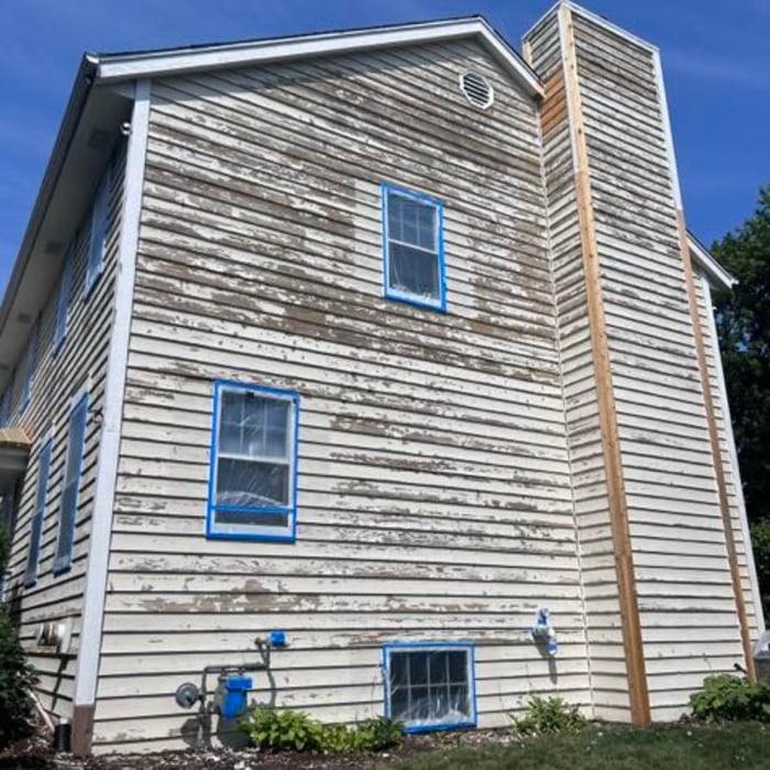 This is before we primed the house. Lots of scrapping but it turned out amazing after we painted.