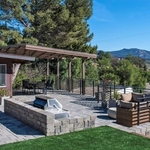 Patio paver, artificial turf, and garden wall installation project overlooking Agoura Hills