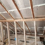 4 inches of 2 inch insulation board installed and foamed, ready for final cap layer of 2 inch Thermax insulation board