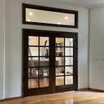 Framed in a wall and added a window and French doors to create a private office.