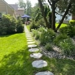 Plantings with a stepping stone path border