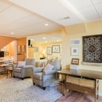 A cheerful and bright living area in a studio-style finished Nashua basement. This space does not sacrifice style!