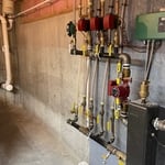 Install condensate pump and neutralizer to bring existing boiler upto code.