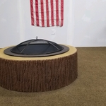 Tree stump wood burner