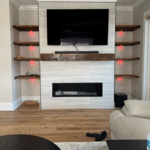 Tile Wall, wood shell, TV, and fireplace