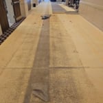 Before corridor carpet installation.