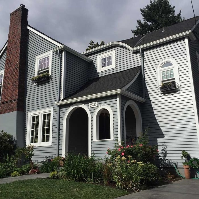 Finished project including Hardie Aspyre lap siding, new GAF Timberline HD roofing, Milgard windows