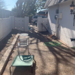 Before Picture. We removed existing concrete patio, and concrete fence.
