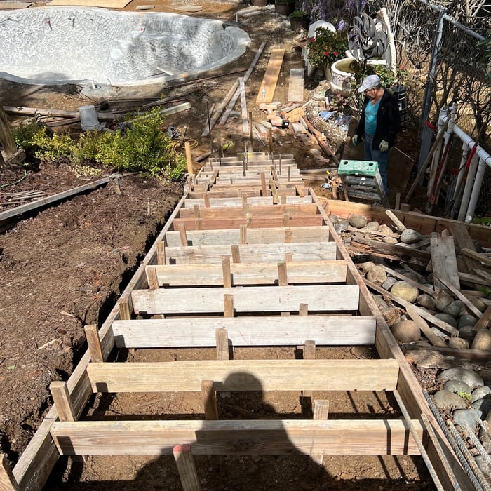 Concrete stone steps being framed.