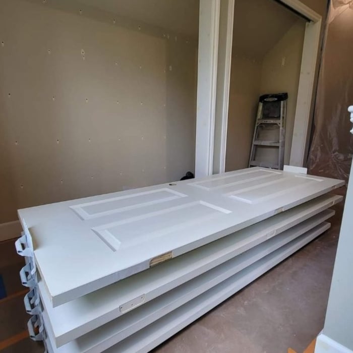 Our proven system to paint and stack doors to maximize space and efficiency.