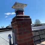 The chimney showing the repointing completed.