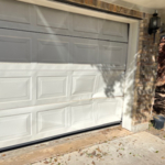 Car backed into existing door bending and warping multiple panels.