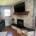 Corner fireplace wall