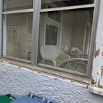 Quite a bit of scraping on the lower portions of the porch trim.