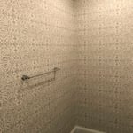 Paint ceiling and woodwork. Install wallpaper.