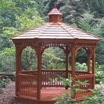 A gazebo is a freestanding patio or deck cover that is usually it’s on entity. There are so many versatile uses for a gazebo. Traditionally they are round, but they can be whatever shape you want, and made out of any material.