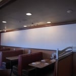 Denny's wall mural install, includes wall prep, sanding, applying mural adhesive
