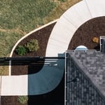 New Concrete Sidewalk with Mulch bed and a stone border