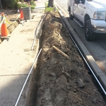 Main line going along city median to the house