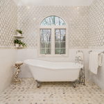 Floor tile was replaced along with a new Victorian Claw Slipper tub to create this dreamy moment