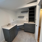 Custom upper cabinets installed and pulls added to the base cabinets. We also added two matching floating shelves!