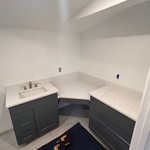 Quartz counter tops added to the base cabinets