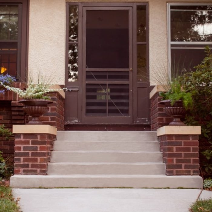 Concrete steps with buttresses.