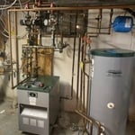 The new boiler & tank to keep these folks warm for many years to come!