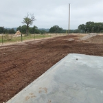 Cleaning up around the slab.