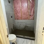 Remodeling bathrooms.