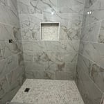 Remodeling bathrooms.