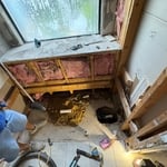 Remodeling bathrooms.