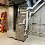 High efficiency Carrier Infinity gas furnace with variable speed blower.