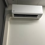 Installing a ductless mini split HVAC system for efficient heating and cooling in a modern home. Perfect solution for additions, garages, and rooms without ductwork.