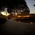 Moss Beach driveway with Belgard Catalina Grana pavers and paver lights