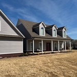 New windows & vinyl siding installation.