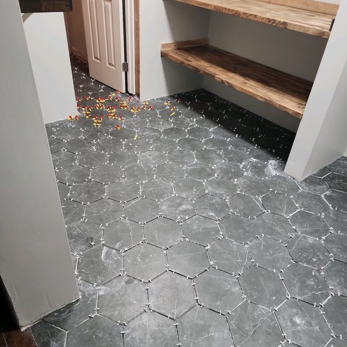 Tile Install in Bathroom and Laundry Room