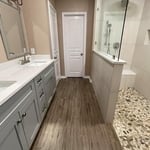 GOODALL- WALK IN SHOWER WITH PONY WALL