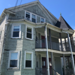 Carpentry - replaced back door, clap boards, nailed loosing clapboards, scrape, caulking, full oil based primer and 2 coats of high quality paint.
