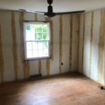 Wallpaper and glue removed, patched walls and trim, full primer and two coats of finish walls, ceilings and trim