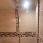 before shower door and fully install lights