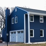 Home exterior makeover. New roof using Owens Corning Trudefinition Duration in Onyx Black. New vinyl siding with Certainteed Monogram in Midnight Blue with White trim. New deck in AZEK Island Oak decking. New Harvey slider. New Thermatru doors.